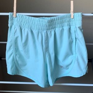 Fila sport running short. Light blue with pocket and liner.